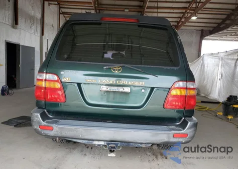 1999 Toyota Land Cruiser из США, поврежденный, VIN JT3HT05J8X0028994